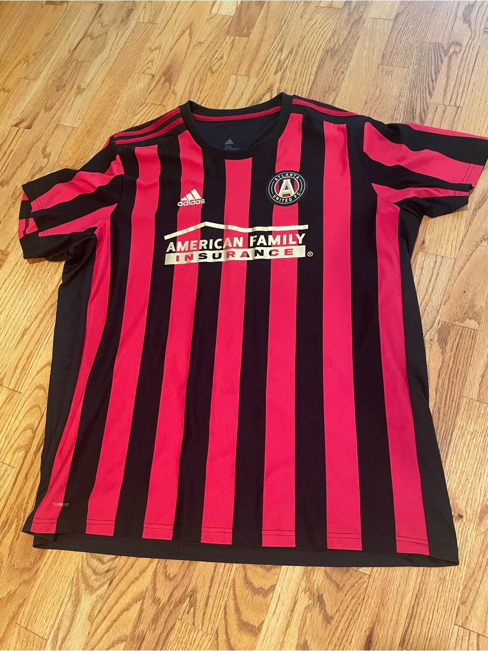 adidas Atlanta United Black and Red Striped Soccer Jersey with Sponsor Patch